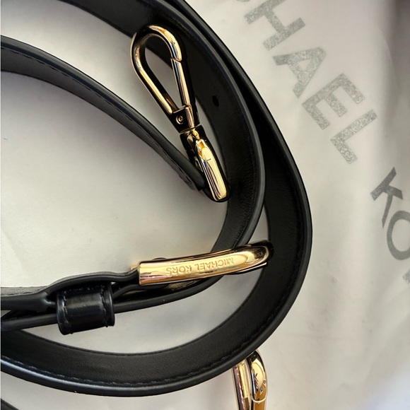 Michael Kors Black and Gold Eyelet Satchel.